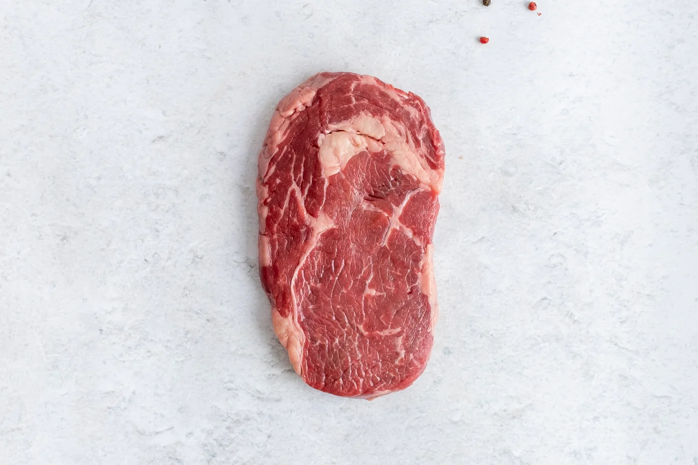 Raw ribeye steak