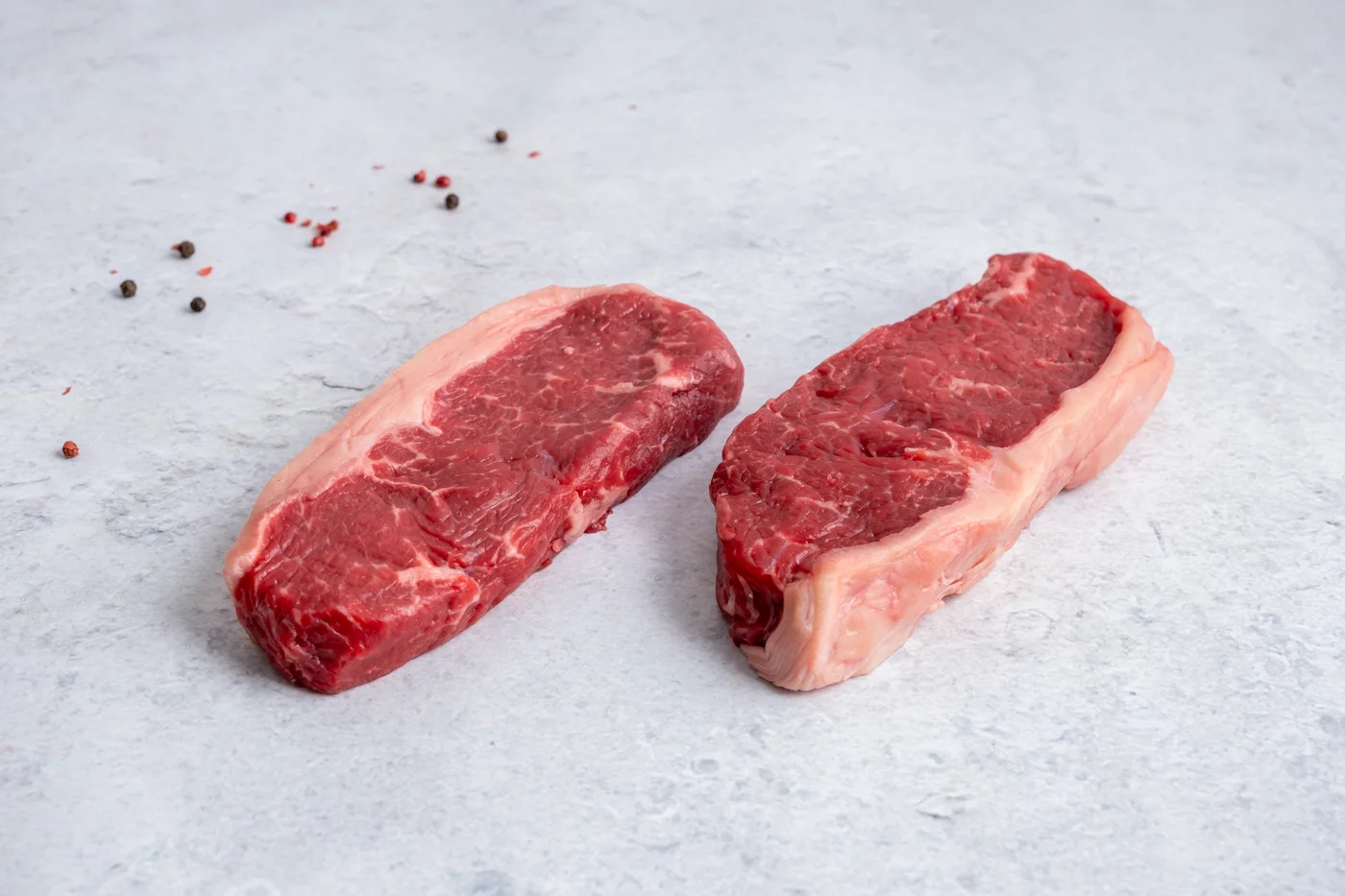 Raw sirloin steaks